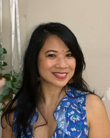 Woman in dress smiling