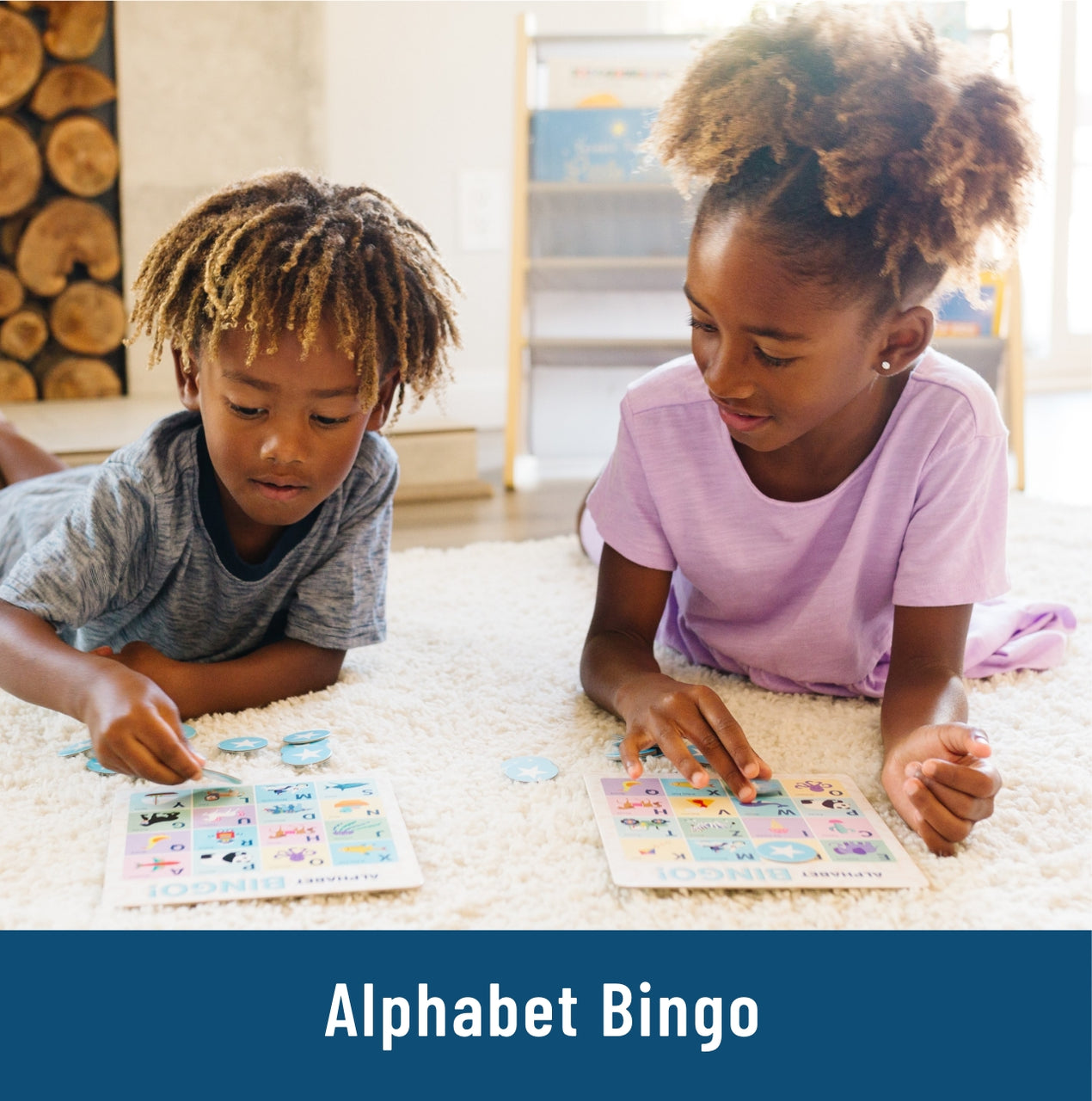 little boy and little girl laying on a white rug playing a game of Bingo, placing game pieces on a cardboard game piece