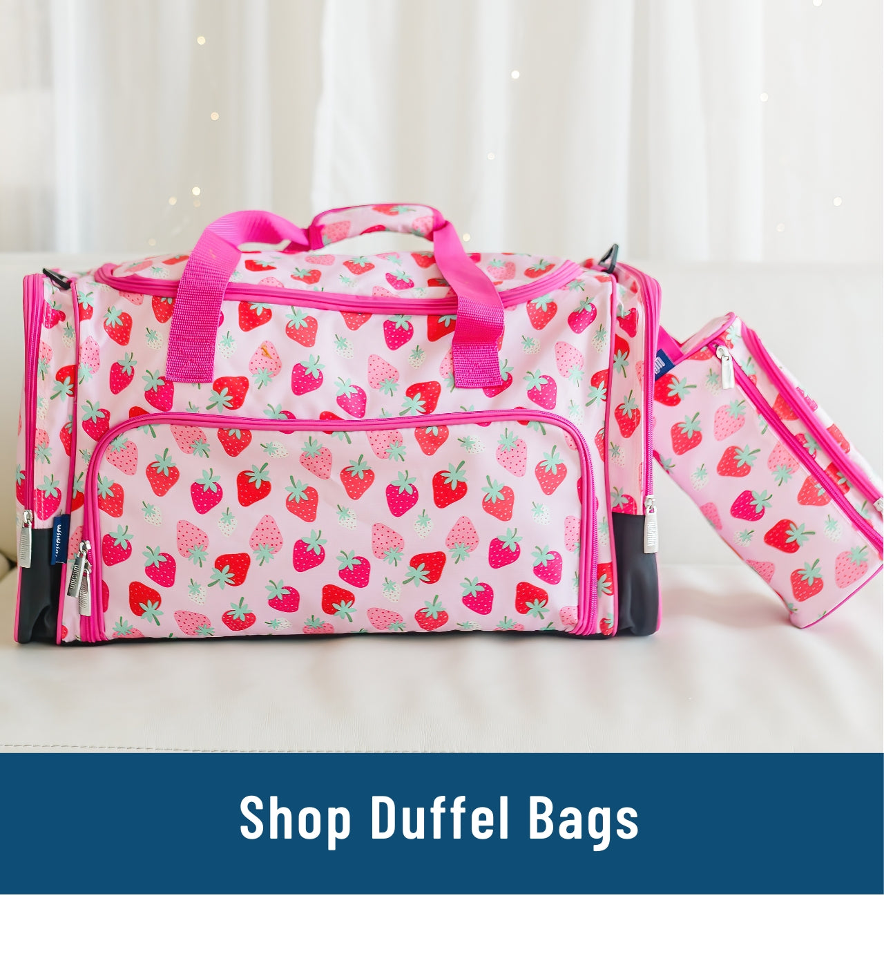 Image of strawberry duffel bag and matching toiletry bag. Link to shop duffel bags.