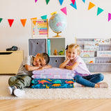 Girl and boy leaning on a stack of folded vinyl rest mats with with rest mat covers