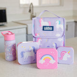 Unicorn-pattern lunch bag, snack containers, and water bottle displayed on a kitchen counter.